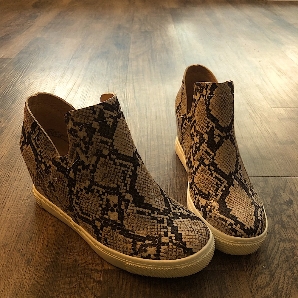 Express snakeskin wedge bootie